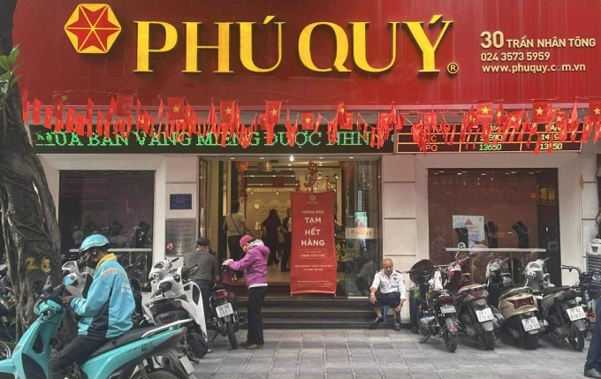 Vietnamese rush to buy gold but face empty shelves on first day as state lifts bullion monopoly